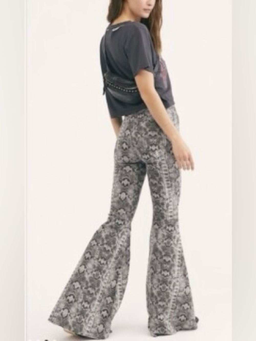 Free People We The Free Just Float On flare jeans in a snake print